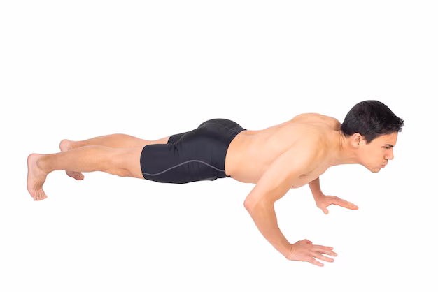A person is performing pushups at home