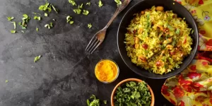 Infographic showing protein content comparison (per 100g) of common Indian ingredients: Paneer, Moong Dal, Tofu, and Sprouts.