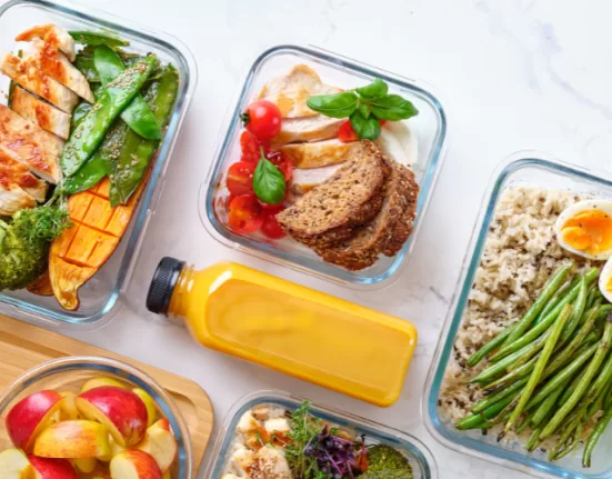 A variety of Superfoods for Gut Health like kefir/curd, berries, and ginger.