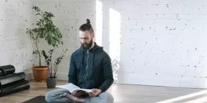 A journal and pen next to a cup of tea, essential tools for a Morning Mindfulness Routine for a Calm Day.