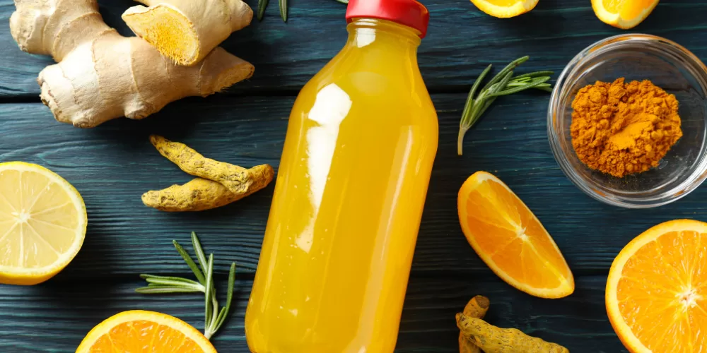 Turmeric (Haldi), Ginger (Adrak), and Lemon, essential ingredients for Immunity Boosting Indian Home Remedies.