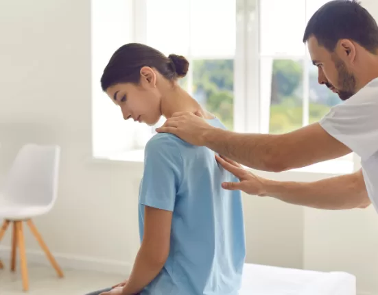 6 Essential Exercises to Fix Lower Back Pain ,A person demonstrating the Cat-Cow stretch, a key pose for Exercises to Fix Lower Back Pain.