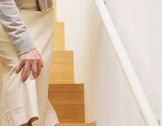 A plate featuring ginger, turmeric, and fatty fish, the top Anti-Inflammatory Foods for Joint Pain.