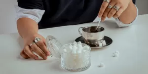 A person taking a brisk walk, symbolizing exercise among the Steps to Reduce High Blood Sugar.