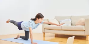 A clean mat and water bottle, symbolizing the simplicity of Home Workouts for Beginners.