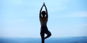 Hands holding a calming stone, symbolizing the use of Mindfulness Exercises for Anxiety for immediate relief.